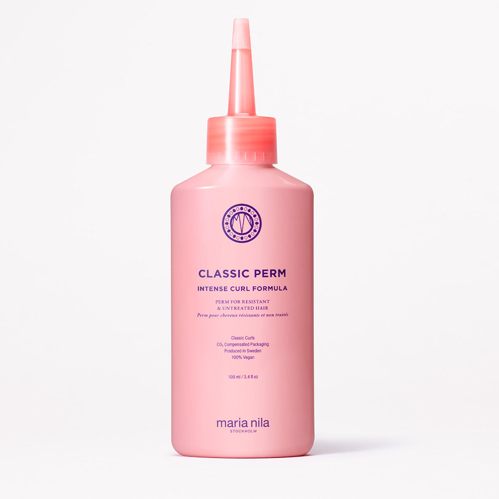Pink bottle of Maria Nila Classic Perm Intense Curl on a white background